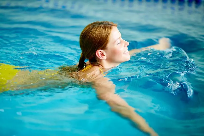Elevated pool with retaining wall and garden bed